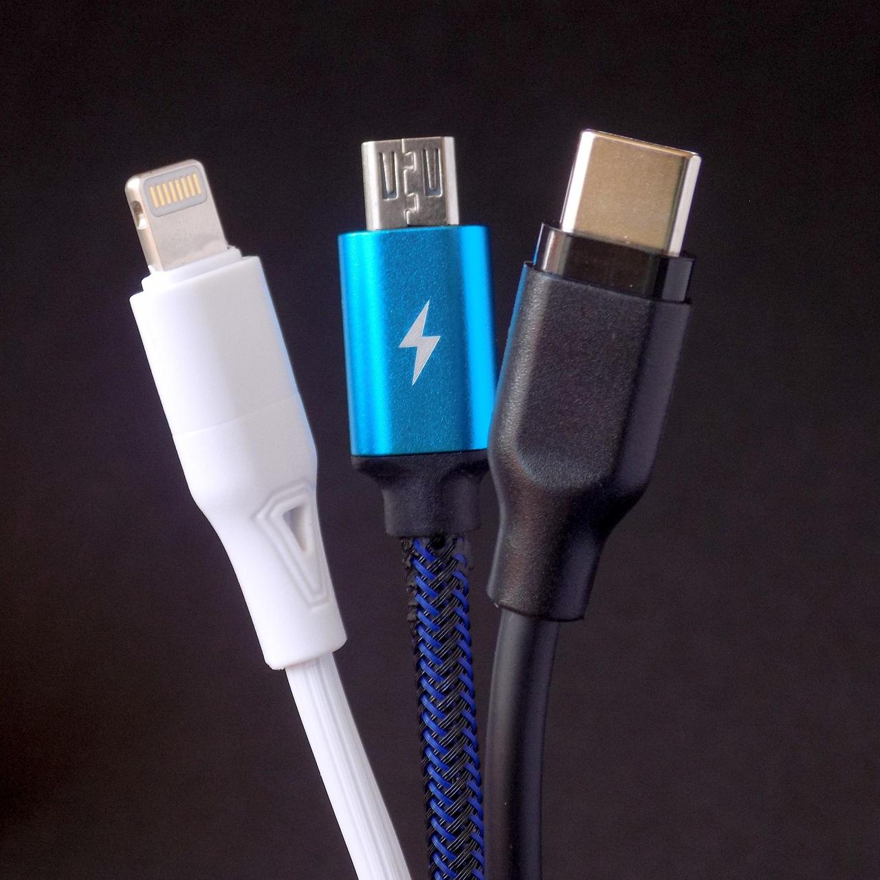 Close-up photo showing the metal ends of three cables extending from bottom to top.