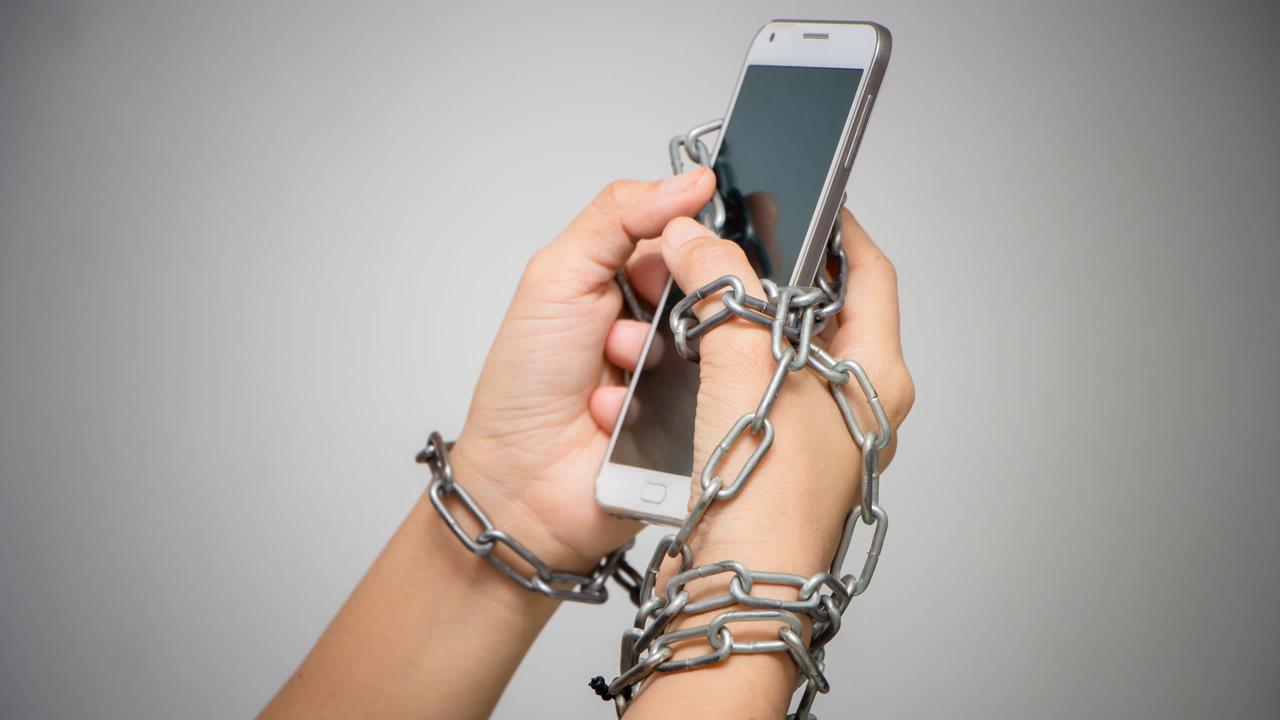 What underlying reasons might explain the habit of constantly checking one’s phone?
